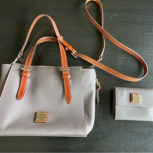 Dooney & Bourke handbag and matching trifold wallet.
